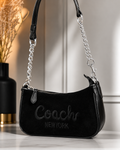 Bolsa de hombro negra con cadena plateada