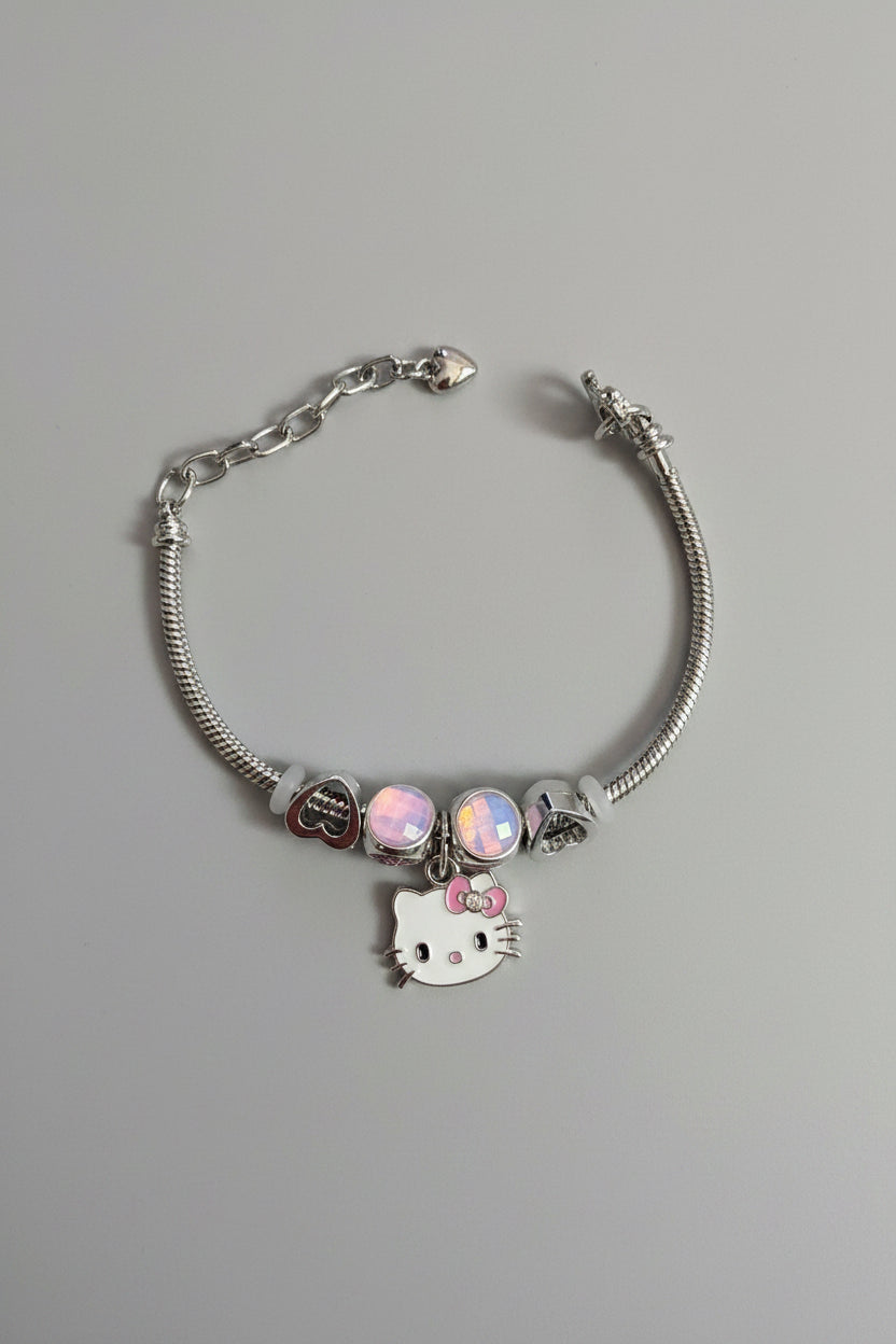 Pulsera Laminada Plateada con Dije Hello Kitty y Charms Rosa – Ajustable size 7-8