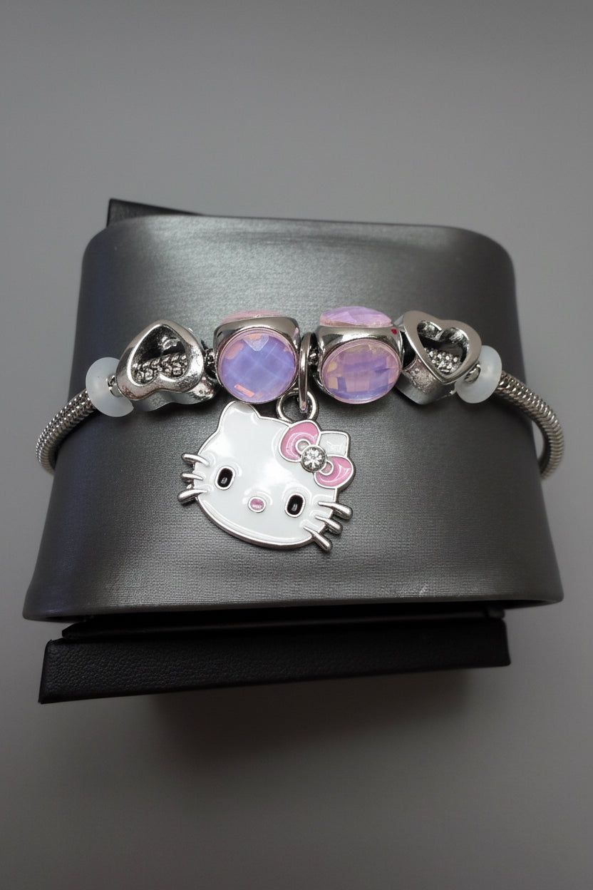 Pulsera Laminada Plateada con Dije Hello Kitty y Charms Rosa – Ajustable size 7-8